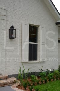LAS raised panel shutter in Sandstone exterior shot